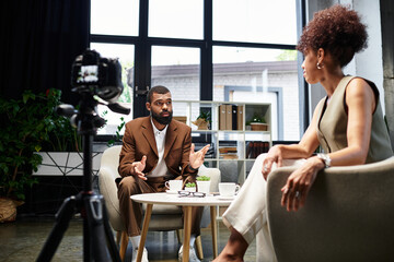 Engaging dialogue during a job interview in a contemporary office space filled with greenery