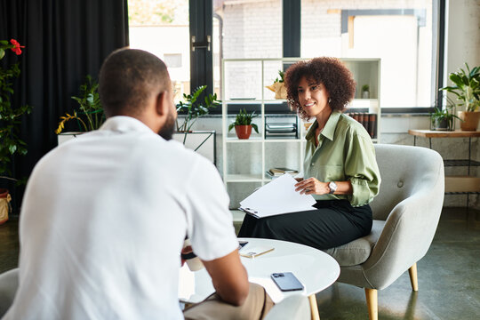 Engaging conversation during a job interview in a modern office environment