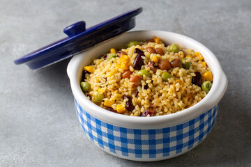 Bulgur pilaf with legumes; with peas, beans and corn kernels.