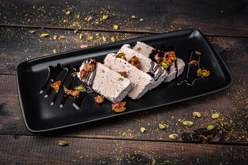 Pistachio semifreddo dessert served on a plate. Italian frozen treat with creamy texture, nutty flavor, and elegant gourmet style.