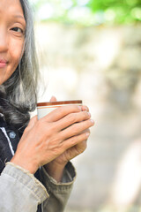 young woman with cup of coffee