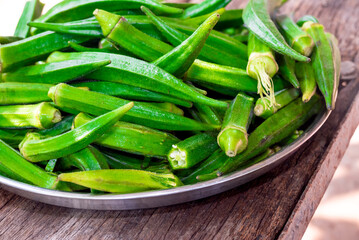 Fresh green okra, Organic vegetable, Asian food ingredients, Okra or Lady's finger or Bhindi fresh green vegetable