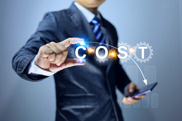 Cost reduction concept with Businessman or entrepreneur holding a gear to reduce cost factors such as production, staffing, employee, maintenance transportation and advertising