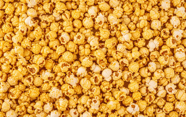 Popcorn arranged randomly forming natural pattern full of texture.