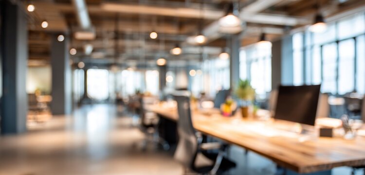 Bright and spacious office space in an unfocused view. Modern blurred background photo for banner, poster or magazine and website background. High quality