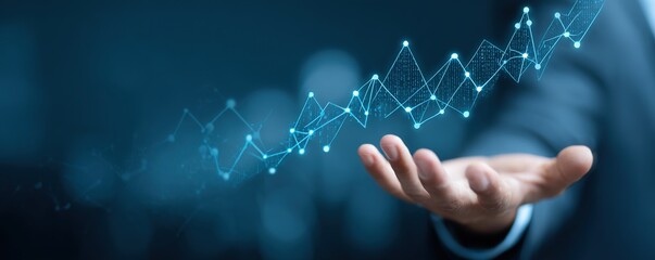 hand of businessman in suit hold banking business finance graph on soft blur blue background and invest in stock market investment point, economic growth and investor concept. High quality
