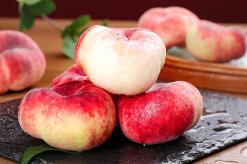 Fresh Red Shaanxi Flat Bottom Peaches on Slate Board - Chinese Stone Fruit Display