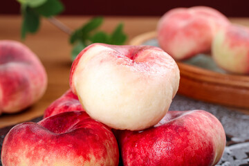 Fresh Shaanxi Red Peaches with Deep Color Freshly Presented on Wooden Surface