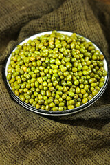 Fresh Green Mung Beans in Bowl on Burlap - Healthy Vegetarian Protein Ingredient for Nutritious Cooking