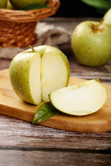 Fresh Jinshuai Green Apples from Shandong China Sliced on Wooden Cutting Board - Healthy Organic Fruit