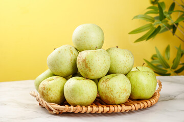 Fresh Green Apples from Shandong China in Wicker Basket - Organic Fruit Harvest Display