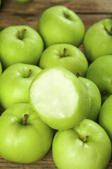 Fresh Green Apples from Shaanxi China Cut Half Showing White Flesh on Wood Background