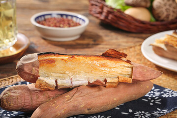 Roasted Sweet Potatoes with Golden Flesh on Rustic Wooden Table Traditional Food Setting