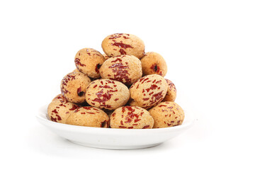 Xinjiang Red Jujube Dates on White Plate - Traditional Chinese Dried Fruit Superfood for Cooking and Soup