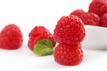 Fresh Red Raspberries with Mint Leaf in White Bowl - Healthy Organic Berries