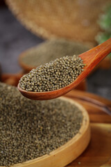 Organic Small Grain Rice Seeds from Shanxi Province in Wooden Spoon - Traditional Farming Ingredient