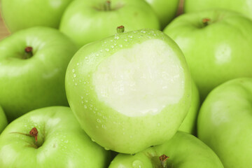 Fresh Green Apples from Shaanxi China with Water Droplets and Peeled Apple Showing White Flesh