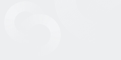 Abstract white glowing geometric lines on grey design.