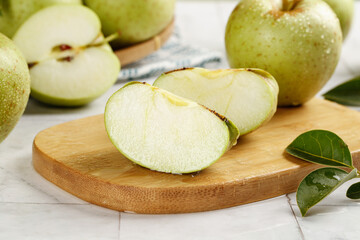 Fresh Green Apples Sliced on Wooden Board - Healthy Fruit from Shandong China