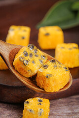 Freeze Dried Passion Fruit Blocks on Wooden Spoon - Healthy Instant Food Ingredient