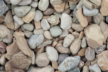 The photo shows a close-up of crushed stone
