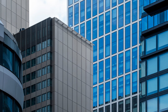 Contemporary facades in Frankfurt with glass and concrete materials, modern design language of European financial architecture combining strength and transparency