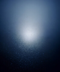 Fototapeta premium Halo Spotlight Snowfall with Center Glow on Deep Blue