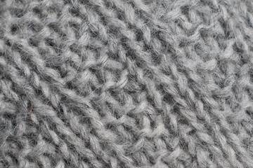 Close-Up of broken Ribbing Knitted Fabric in Heathered Gray Yarn