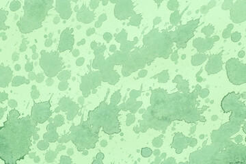 artistic cover design: light green canvas covered with green paint spots