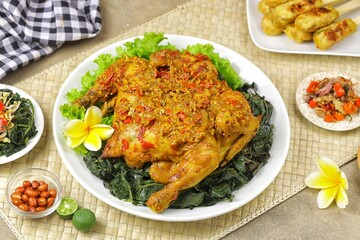 Ayam Betutu is a Balinese specialty. It's made from whole chicken or duck cooked with Balinese spices.