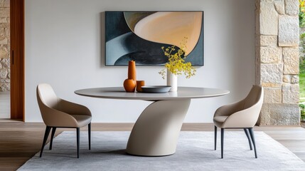 A modern interior with a round table and fashionable chairs, a work of modern art on the wall.