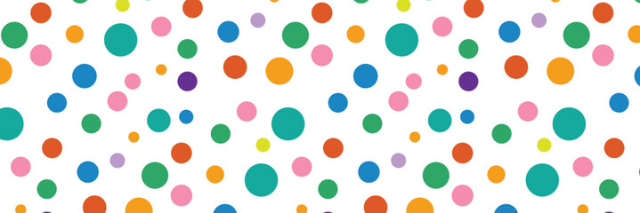Seamless multicolor polka dot vector pattern, playful pastel fabric and paper background.