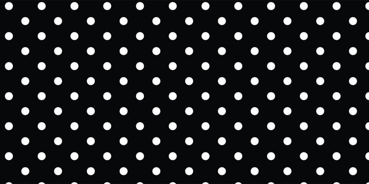 Seamless black and white polka dot vector pattern, retro fabric and wallpaper background.