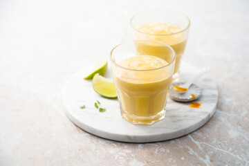 Healthy mango lassi with turmeric