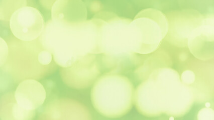 Obraz premium Green bokeh abstract background blur, holiday wallpaper