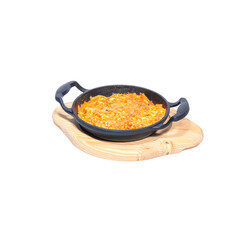 Shakshuka (menemen) eggs with tomato sauce for Turkish breakfast. Isolated on white background.Fried egg. Fried egg in a pan. Isolated on white background.
