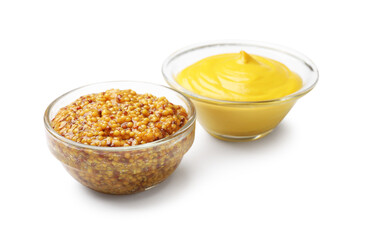 Tasty mustard sauces in bowls isolated on white