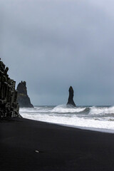 Balast columns on black sand beach in Iceland