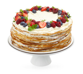 Delicious crepe cake with fresh berries isolated on white