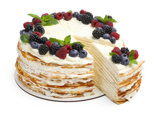 Tasty crepe cake with berries and mint isolated on white