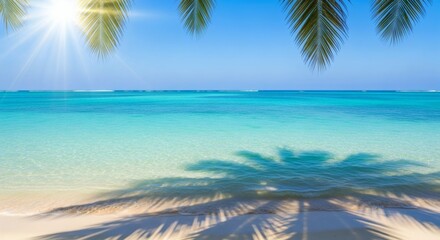 Tropical beach with turquoise water palm shadows and a bright sun