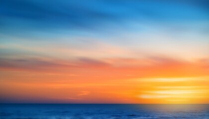 Obraz premium a soft blended background featuring cool blue and warm orange hues creating a serene and artistic atmosphere