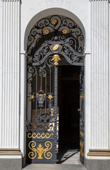 Ornate opened door to the house, Czechia