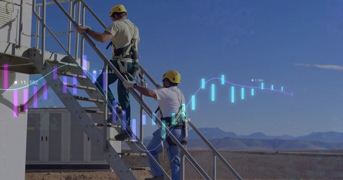Climbing technicians wearing yellow hard hats on desert metal stairs with data overlay, copy space