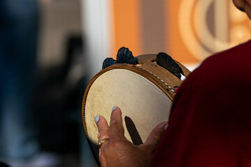 The rhythm of a tambourine at a live folk performance, Live Performance
