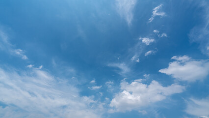 Blue Sky with Fluffy White Clouds on a Clear Day
