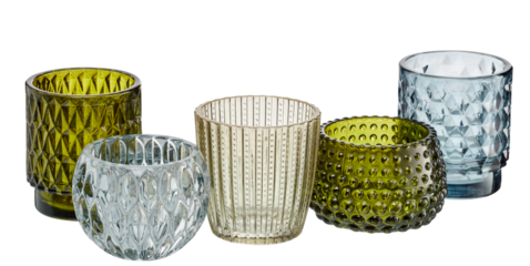 Set of glasses with sparkling diamond patterns scattered around cut out isolated transparent background