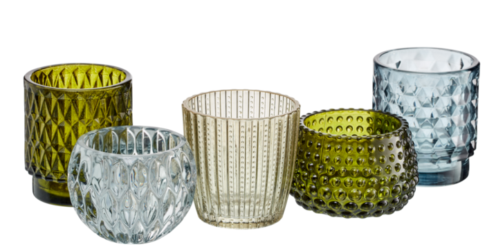 Set of glasses with sparkling diamond patterns scattered around cut out isolated transparent background