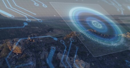 Obraz premium Projecting hologram with rings and markers above hilltop, grid overlay, circuit traces, copy space