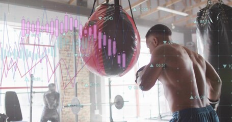 Punching shirtless male athlete delivering strike to red punching bag at gym, with data overlays